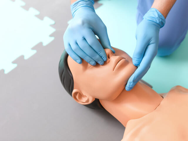 CPR being administered on a dummy