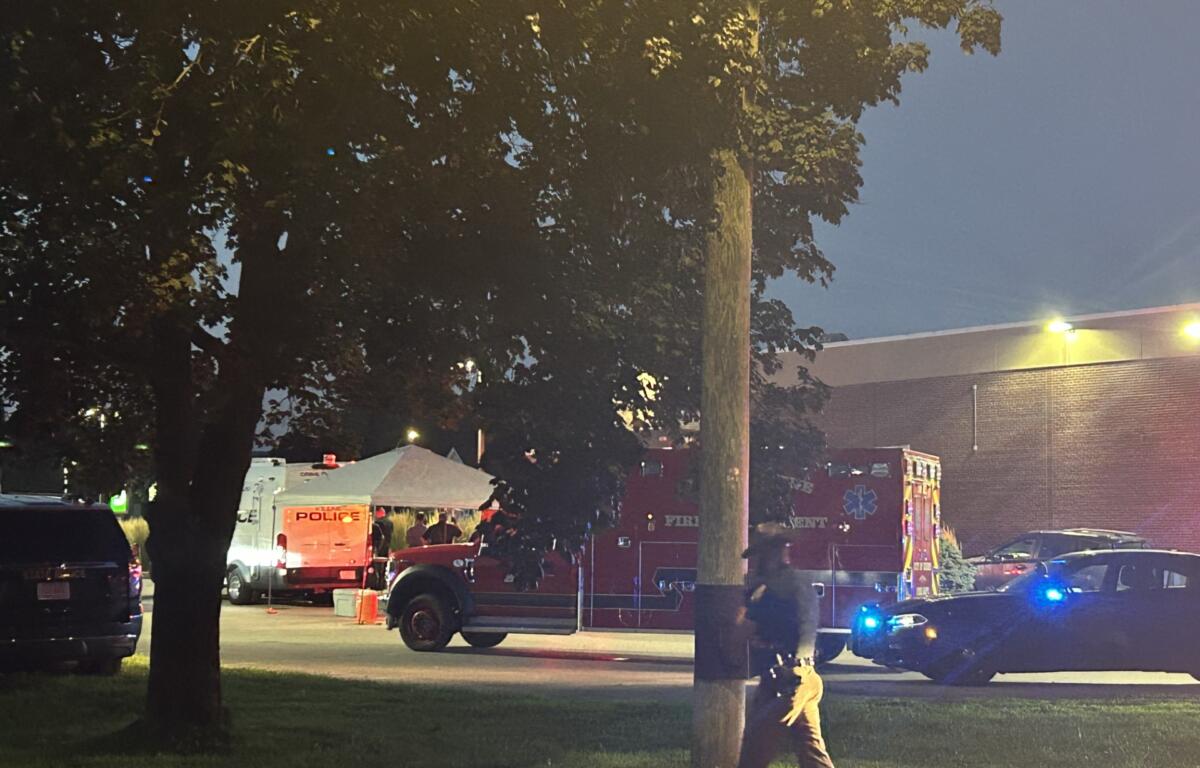 Emergency and police vehicles outside TD Bank after the five-hour standoff ended Tuesday.