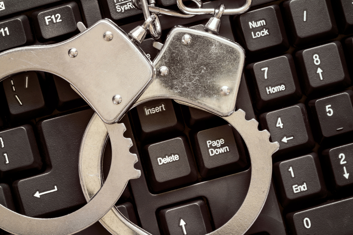 Handcuffs on keyboard