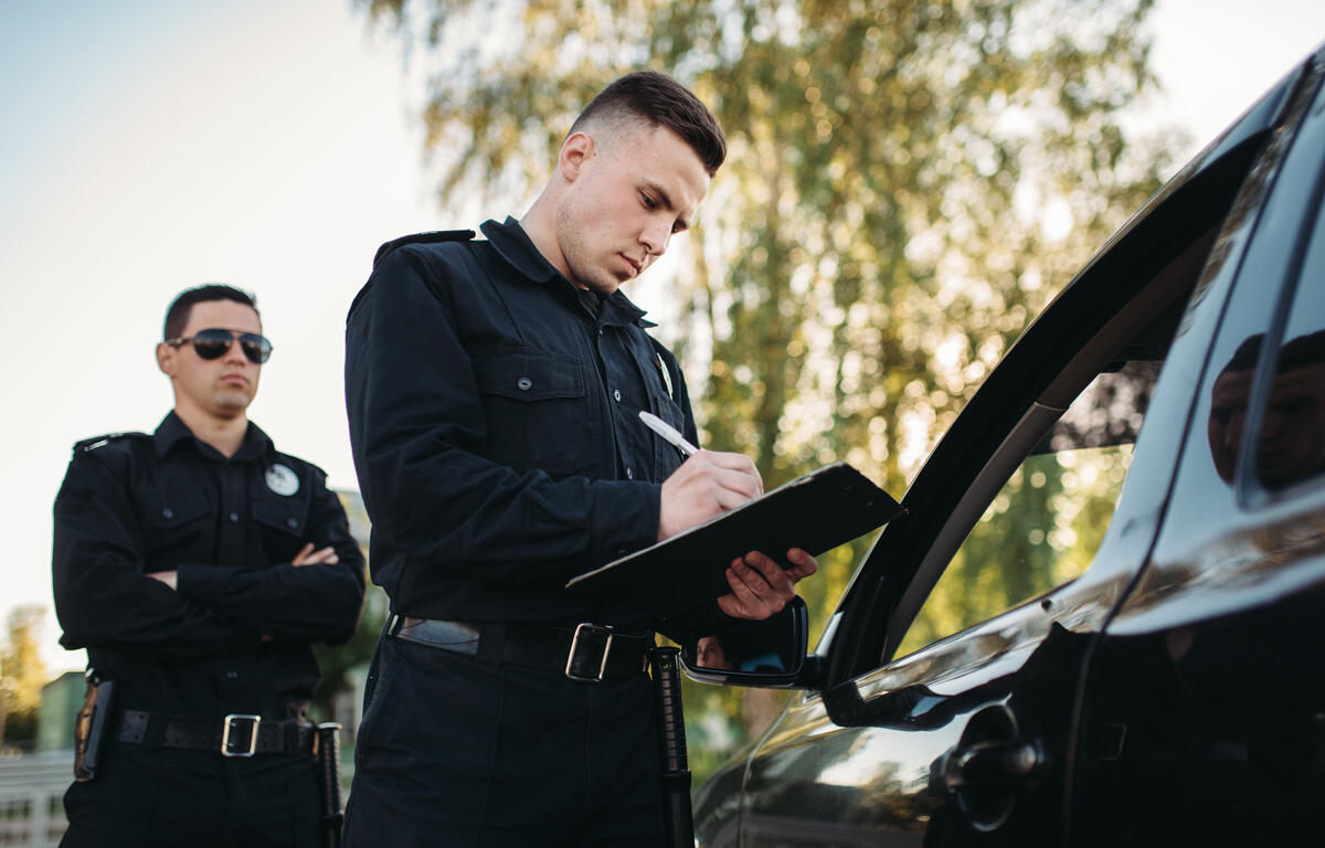 Police pull over a driver