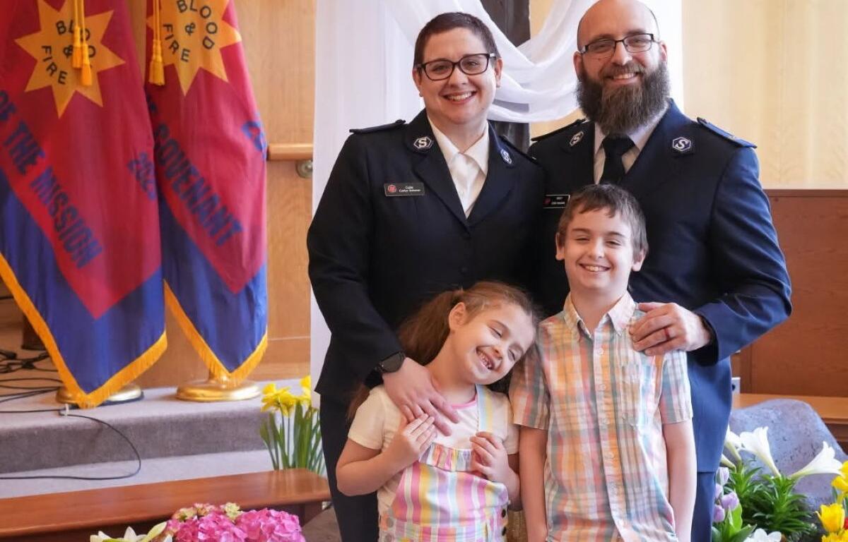 New Salvation Army lieutenants and their children