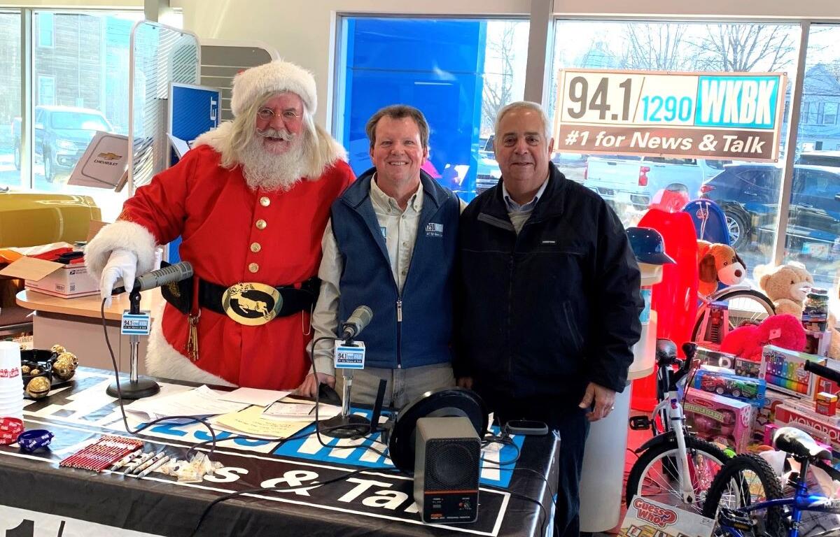 Steve Levy, Toy City owner with Dan Mitchell and Santa