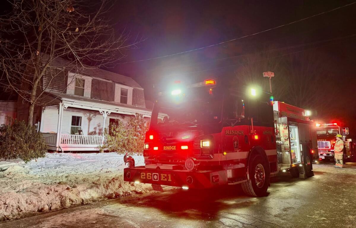 Rindge Fire Truck outside of 44 Mountain Road.