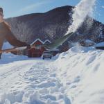 Woman Shoveling snow