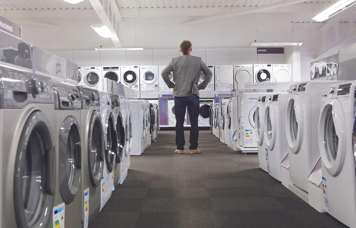 Customer shopping for a washing machine