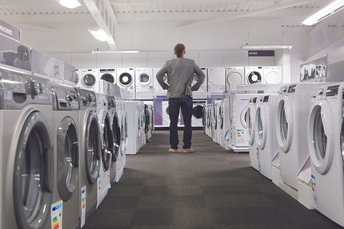 Customer shopping for a washing machine