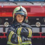 Kid in fireman's uniform