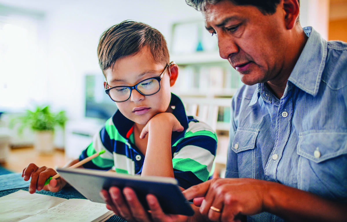 Parent helping child with school work