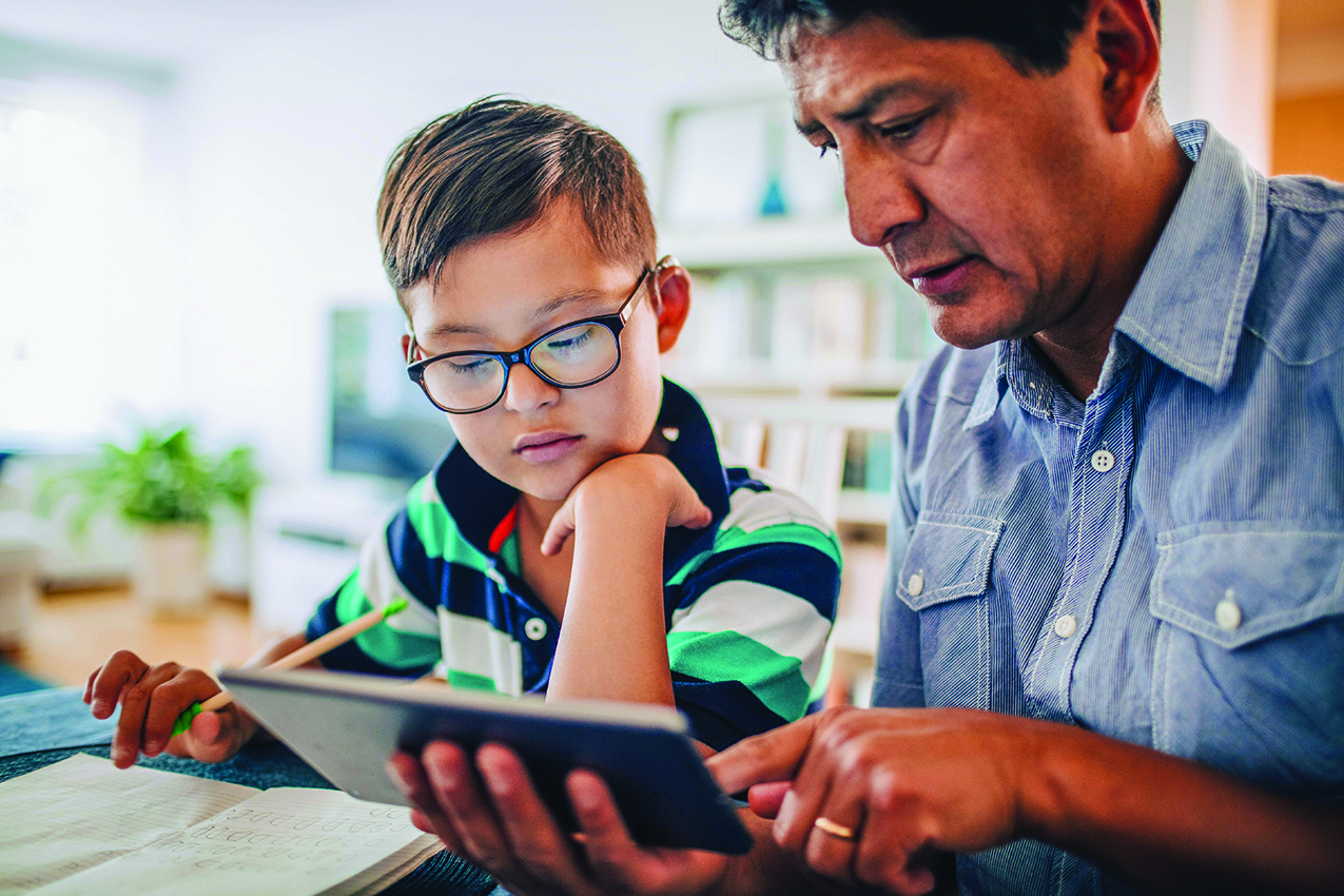 Parent helping child with school work